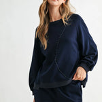 Navy Kaely Top, Joh Brand, luxury long sleeve top, matte stretch crepe knit, minimalist designer top, tonal stitch detail, premium women's knitwear, high-end loungewear, elegant relaxed fit top at ooh la la! in Grapevine TX 76051