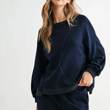 Navy Kaely Top, Joh Brand, luxury long sleeve top, matte stretch crepe knit, minimalist designer top, tonal stitch detail, premium women's knitwear, high-end loungewear, elegant relaxed fit top at ooh la la! in Grapevine TX 76051