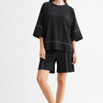 Black Carlay Top, Joh, luxury top, minimalist fashion, contrast stitch blouse, high-end short sleeve, designer relaxed fit, quiet luxury clothing, premium women's tops at ooh la la in Grapevine TX 76051