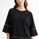 Black Carlay Top, Joh, luxury top, minimalist fashion, contrast stitch blouse, high-end short sleeve, designer relaxed fit, quiet luxury clothing, premium women's tops at ooh la la in Grapevine TX 76051