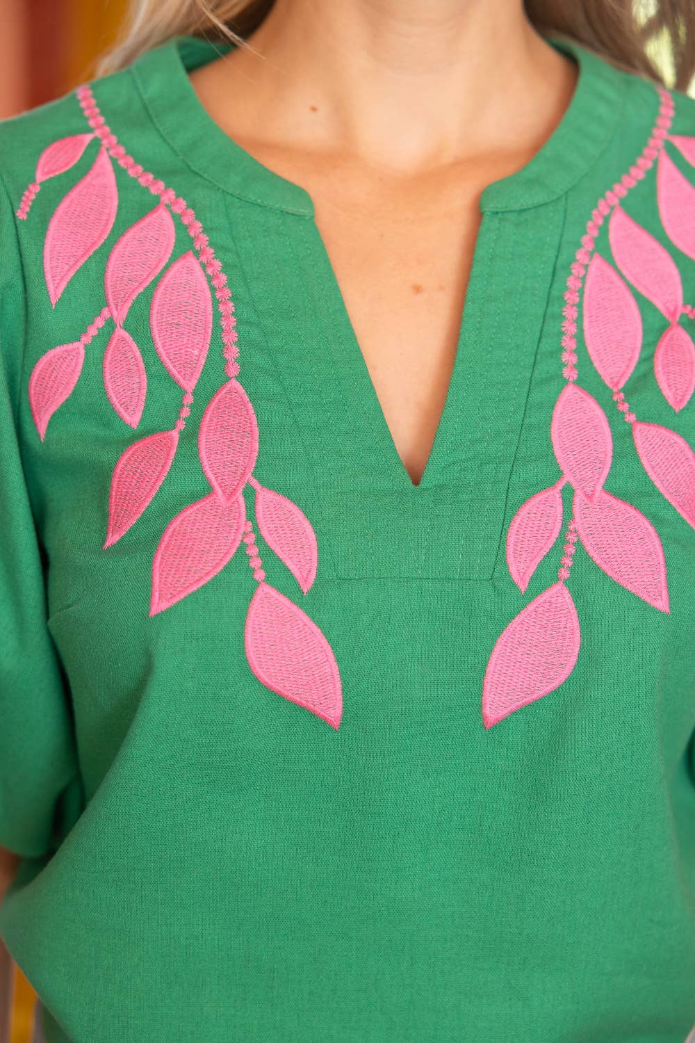 embroidered linen top, bubble sleeve blouse, green floral top, resort wear for women, v-neck summer blouse, pink and green top, botanical embroidery clothing, puff sleeve linen shirt at ooh la la! in Grapevine TX 76051