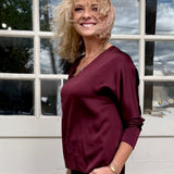 Satin Long Sleeve V-Neck Blouse In wine at ooh la la! In Grapevine TX 76051