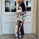Satin Village Print Pant In black at ooh la la! in Grapevine TX 76051