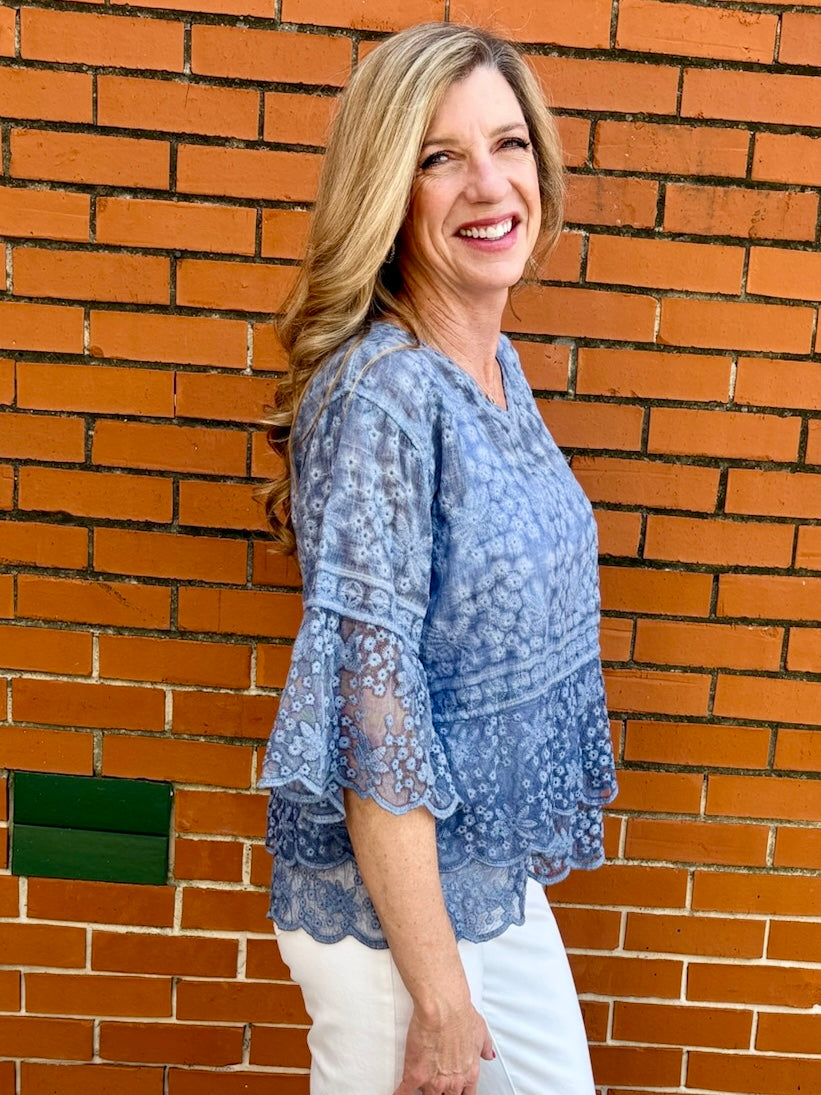 Blue Lace blouse, cotton boho top, bell sleeve shirt, floral embroidery top, scalloped hem blouse, feminine V-neck top, tiered lace top, bohemian fashion, white lace blouse, black vintage style top. at ooh la la! in Grapevine TX 76051