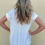 White oversized blouse, sleeveless button down, women's gauze shirt, relaxed fit summer top, drop shoulder blouse, breathable white shirt, chic sleeveless blouse. at ooh la la! in Grapevine TX 76051
