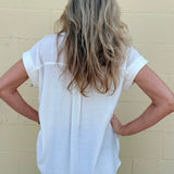 White oversized blouse, sleeveless button down, women's gauze shirt, relaxed fit summer top, drop shoulder blouse, breathable white shirt, chic sleeveless blouse. at ooh la la! in Grapevine TX 76051