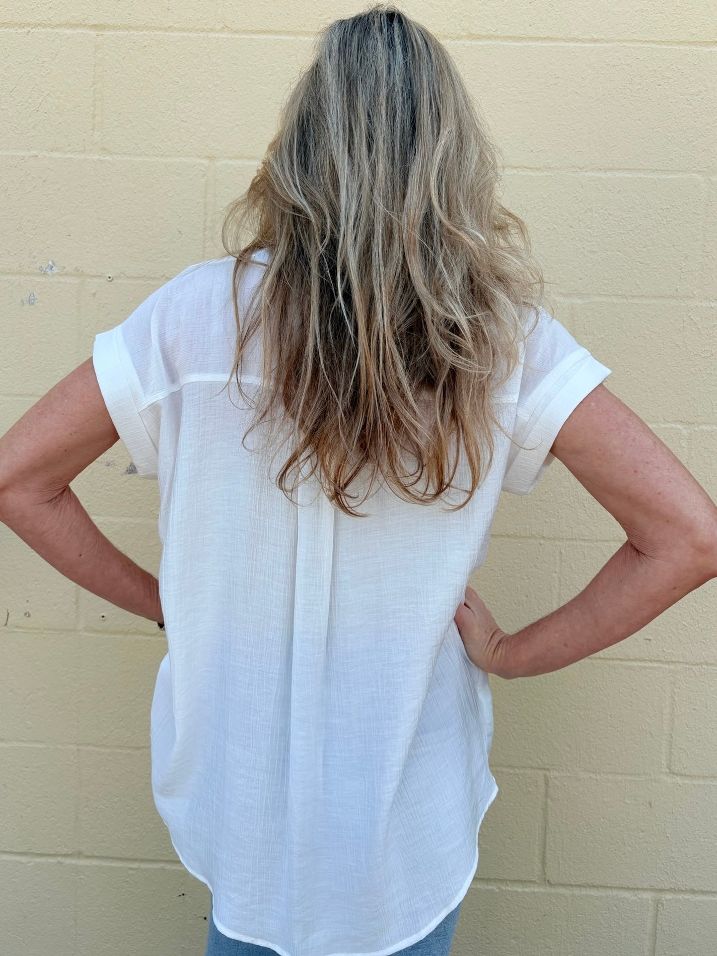 White oversized blouse, sleeveless button down, women's gauze shirt, relaxed fit summer top, drop shoulder blouse, breathable white shirt, chic sleeveless blouse. at ooh la la! in Grapevine TX 76051