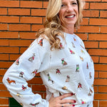 Holiday Dogs on Repeat Sweatshirt at ooh la la! In Grapevine TX 76051