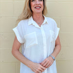 White oversized blouse, sleeveless button down, women's gauze shirt, relaxed fit summer top, drop shoulder blouse, breathable white shirt, chic sleeveless blouse. at ooh la la! in Grapevine TX 76051