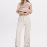 high rise straight jeans, paisley embroidery denim, cream cutout jeans, lyocell blend pants, bohemian straight leg, designer hem denim, white high waisted jeans at ooh la la! in Grapevine TX 76051