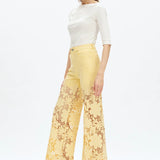 Butter yellow Wide leg jeans, floral lace denim, rhinestone jeans, high rise wide leg, pastel yellow jeans, pink lace jeans, statement denim, women’s high stretch jeans. at ooh la la! in Grapevine TX 76051