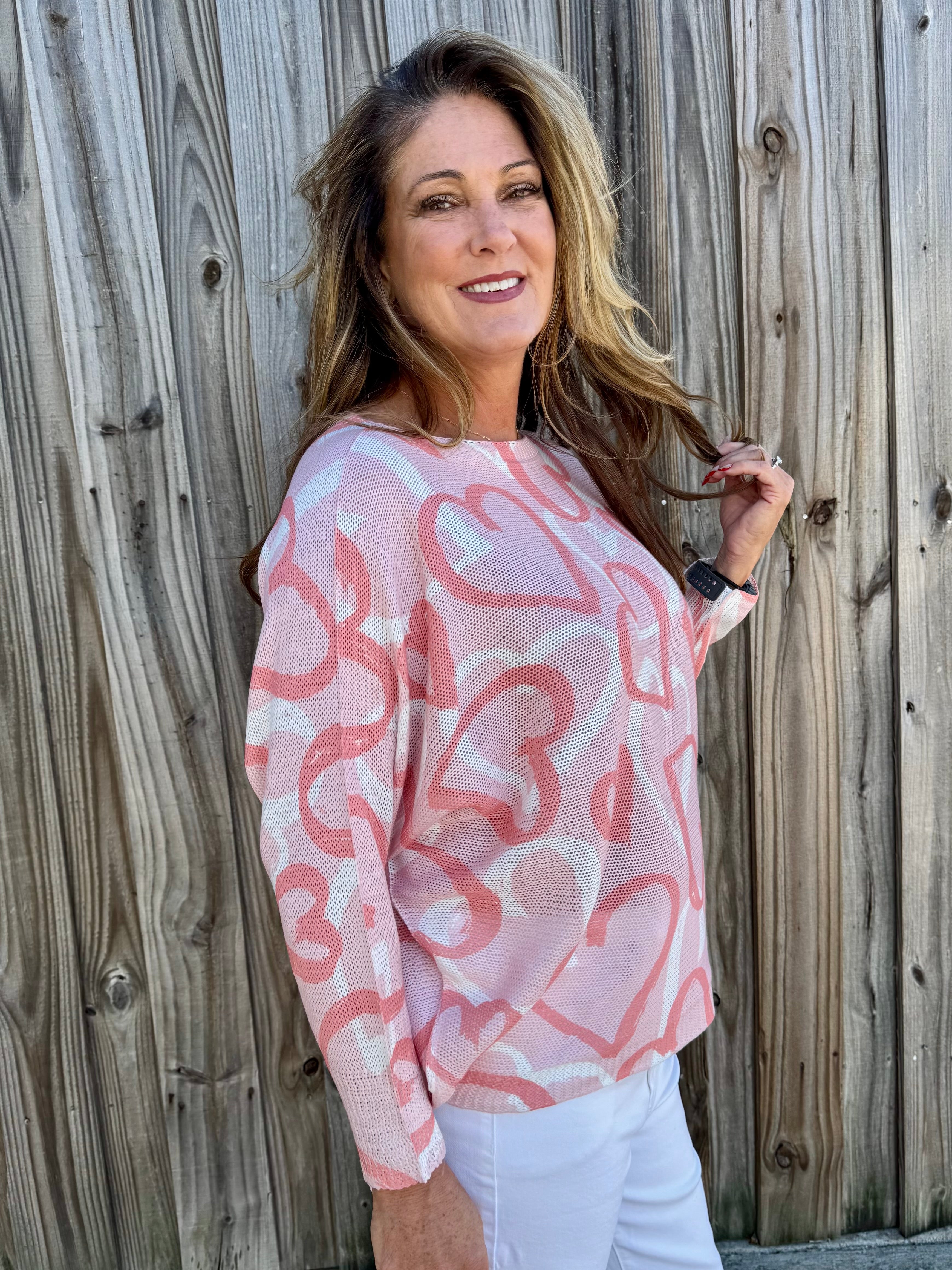 Soft Pink Hearts Batwing Sweater at ooh la la! in Grapevine TX 76051