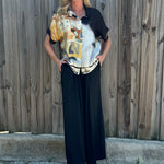 Made in Italy Satin Wide Leg Pants in Black at ooh la la! in Grapevine TX 76051