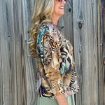 Shimmer Jungle Floral Batwing Sweater at ooh la la! in Grapevine TX 76051