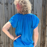 Sofia Caroline Satin Blouse in cerulean blue at ooh la la! in Grapevine TX 76051