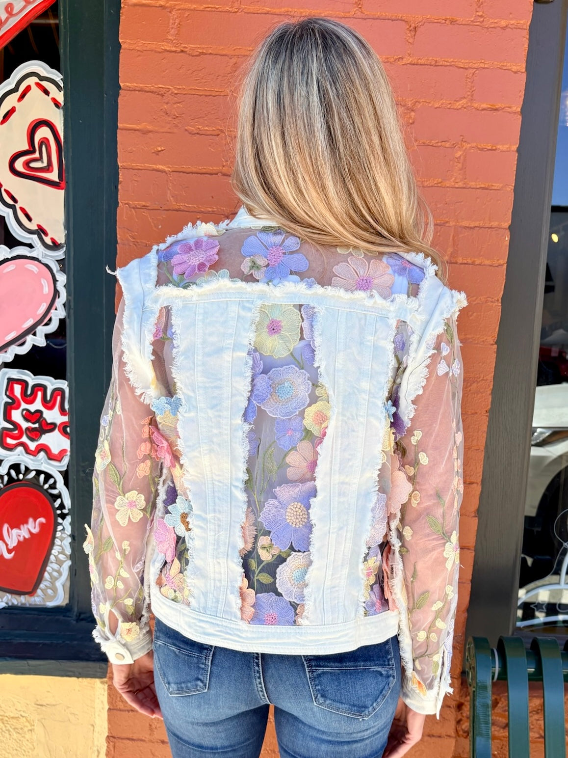Denim Jacket with Floral Appliqué on Mesh in white at ooh la la! in Grapevine TX 76051