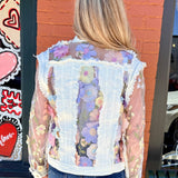 Denim Jacket with Floral Appliqué on Mesh in white at ooh la la! in Grapevine TX 76051