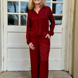 Aeson Button-Up Blouse and Harmon pant in Salem’s Door (burgundy) at ooh la la! in Grapevine TX 76051
