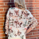 Giddy Up! Western Cowboys and Leopard Batwing Sweater in beige at ooh la la! in Grapevine TX 76051