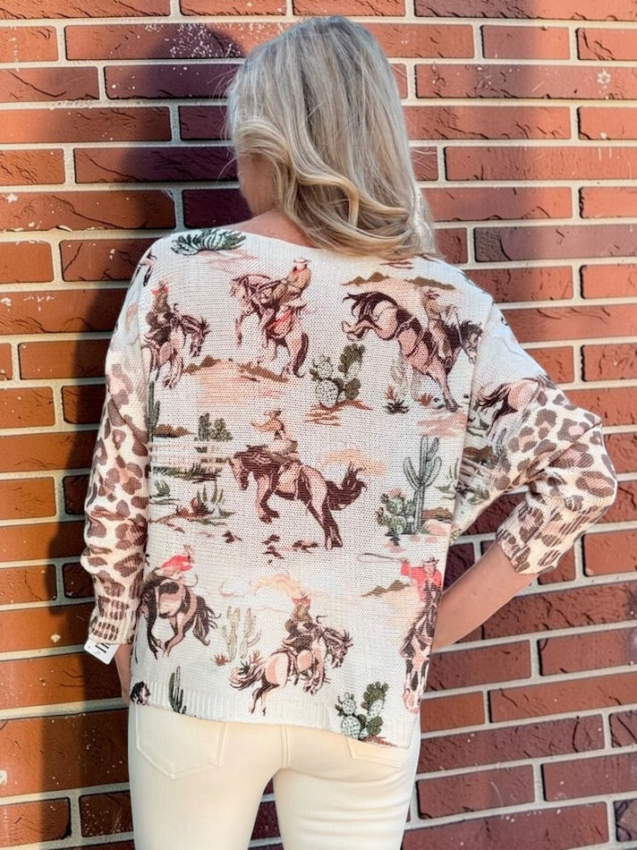 Giddy Up! Western Cowboys and Leopard Batwing Sweater in beige at ooh la la! in Grapevine TX 76051