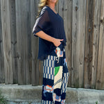 Made in Italy Satin Horse Print Pants in navy at ooh la la! in Grapevine TX 76051