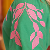 embroidered linen top, bubble sleeve blouse, green floral top, resort wear for women, v-neck summer blouse, pink and green top, botanical embroidery clothing, puff sleeve linen shirt at ooh la la! in Grapevine TX 76051