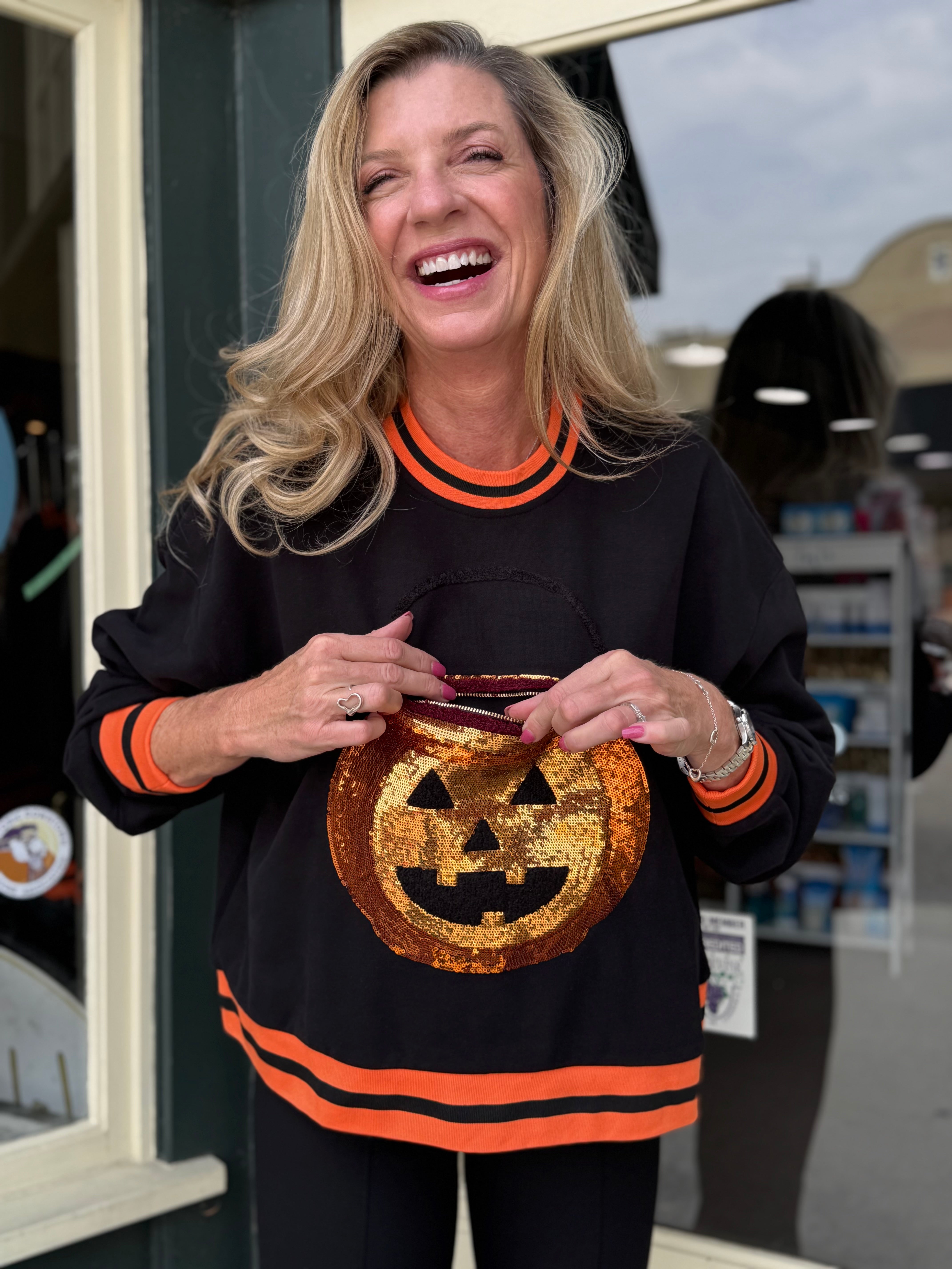 Queen of Sparkles Black Halloween Pumpkin Candy Bucket Sweatshirt at ooh la la! in Grapevine TX 76051
