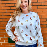 Holiday Dogs on Repeat Sweatshirt at ooh la la! In Grapevine TX 76051