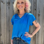 Sofia Caroline Satin Blouse in cerulean blue at ooh la la! in Grapevine TX 76051