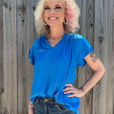 Sofia Caroline Satin Blouse in cerulean blue at ooh la la! in Grapevine TX 76051