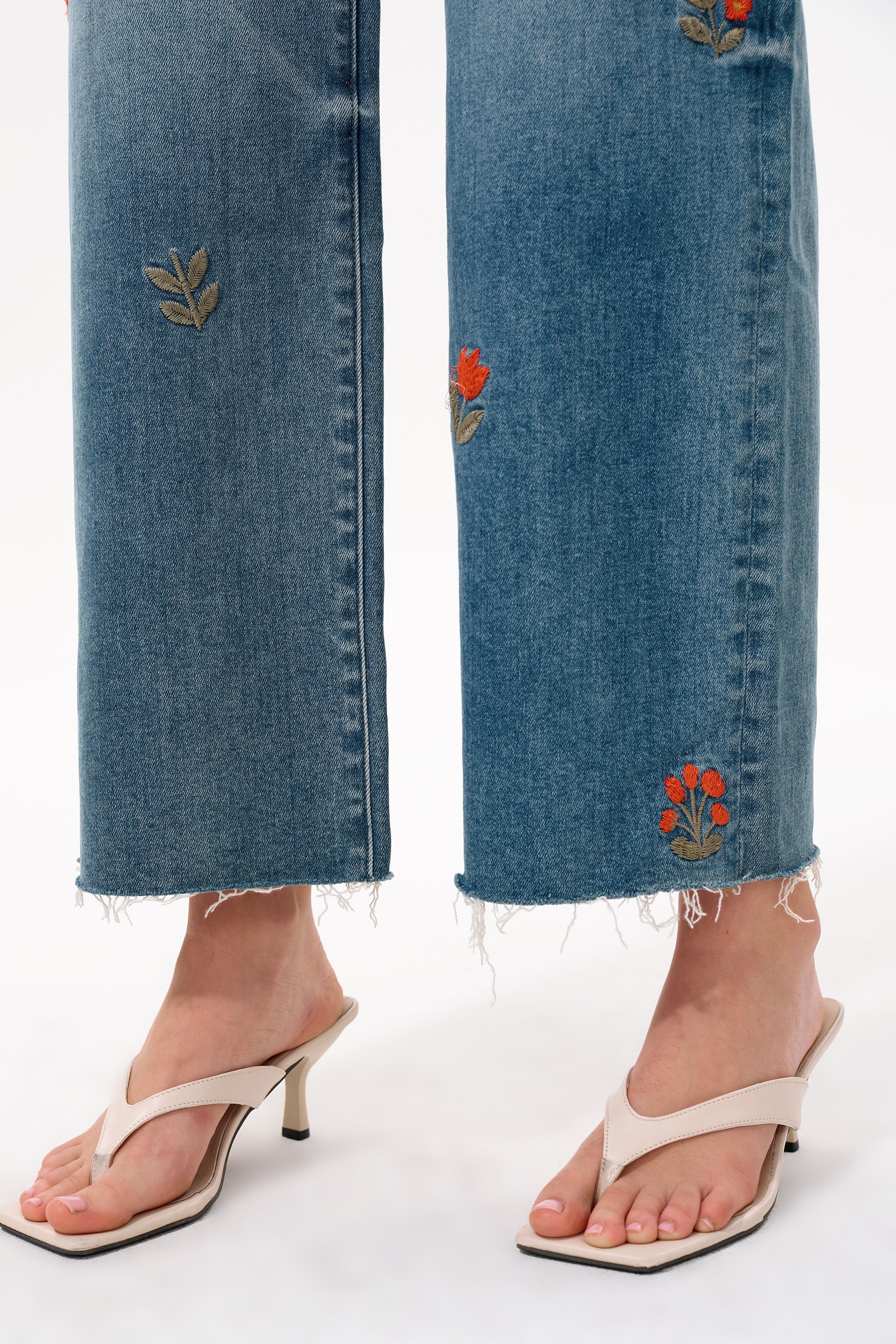 Charming Flowers Embroidered Mid Rise Wide Leg Jeans at ooh la la! in Grapevine TX 76051