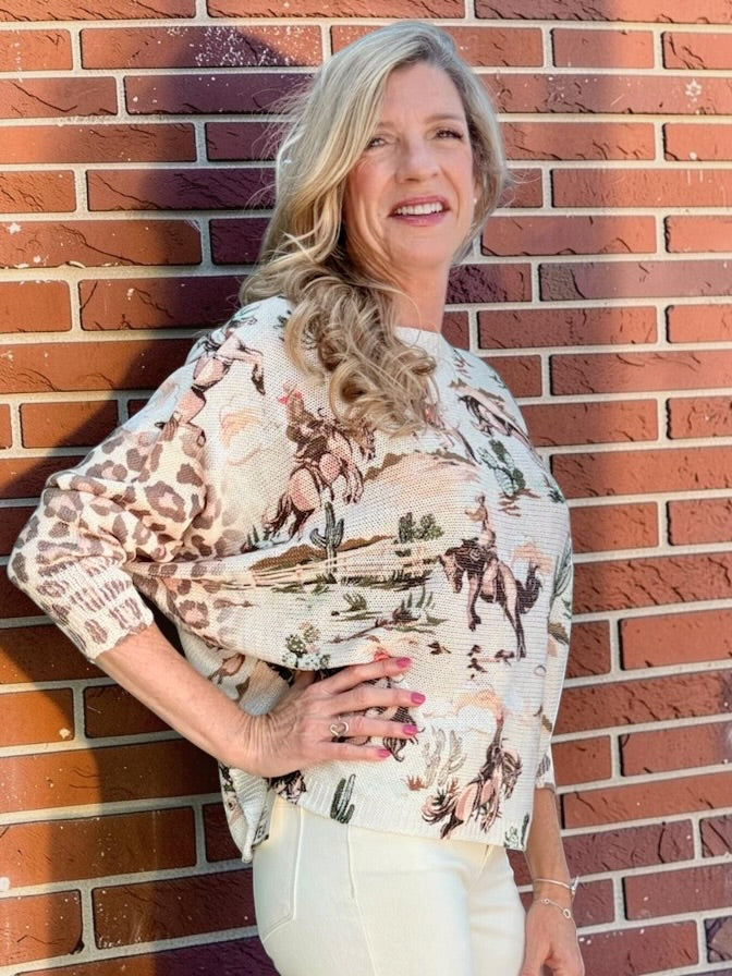 Giddy Up! Western Cowboys and Leopard Batwing Sweater in beige at ooh la la! in Grapevine TX 76051
