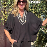 Leopard Trim Dolman Top at ooh la la! in Grapevine TX 76051