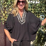 Leopard Trim Dolman Top at ooh la la! in Grapevine TX 76051