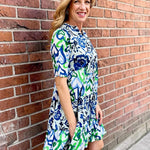 Organic cotton dress, floral shirt dress, tiered summer dress, Dress Addict, crinkle cotton dress, sustainable fashion, mixed floral and hearts print, summer dresses with pockets. at ooh la la in Grapevine TX 76051