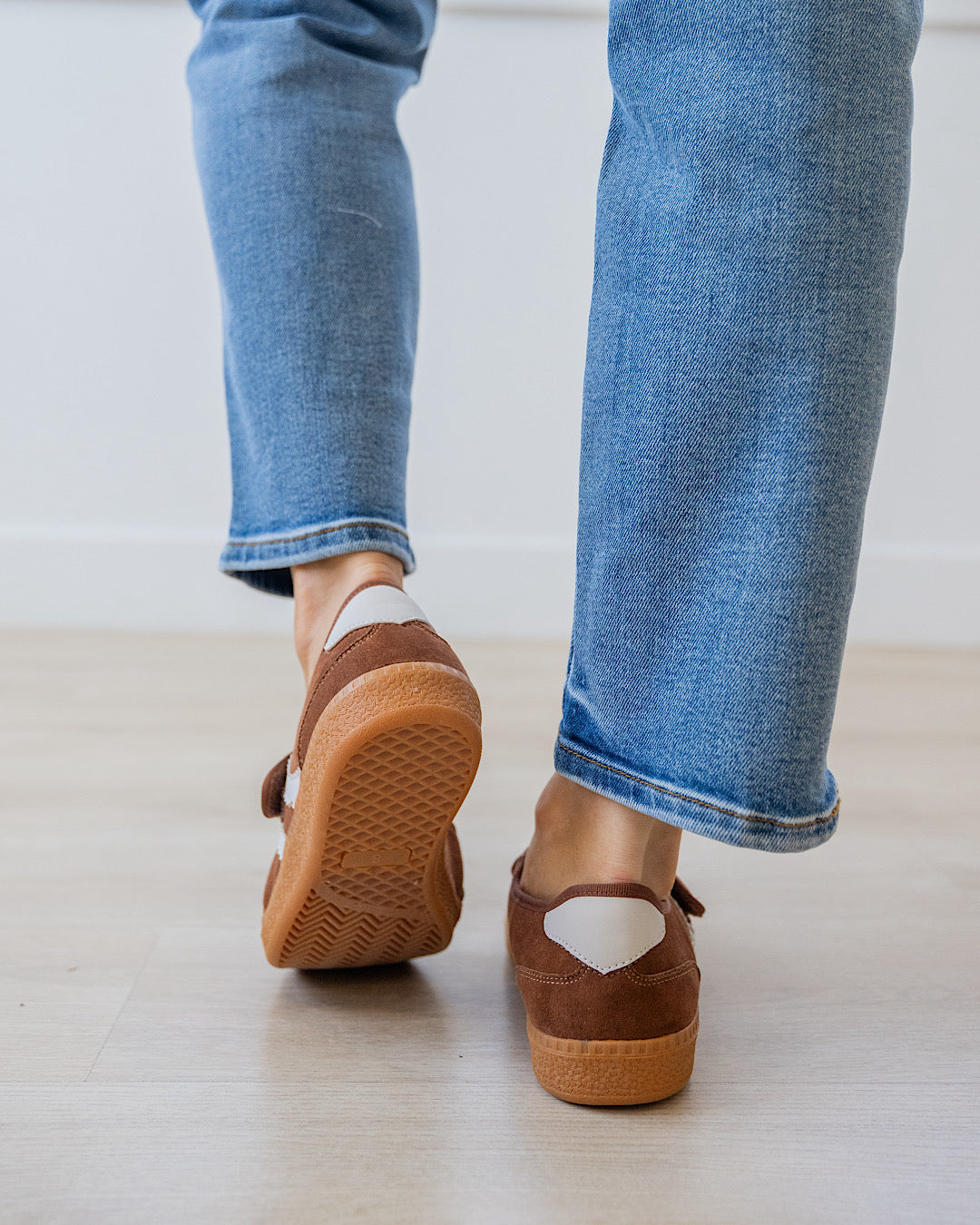 Corky's Calm Down Maryjane Sneaker in chestnut brown suede with gum sole, worn with jeans at ooh la la! in Grapevine TX 76051