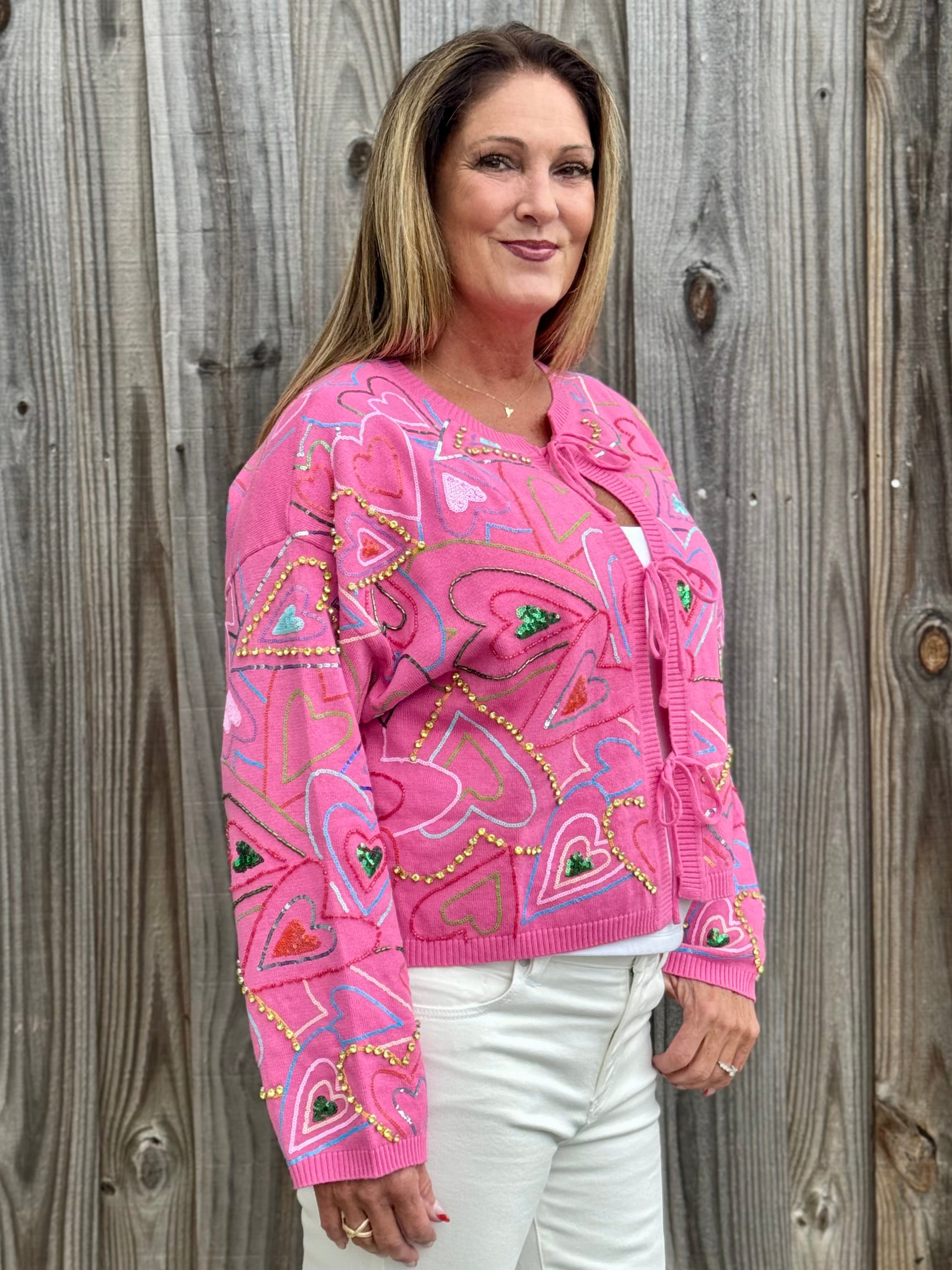 Queen of Sparkles Multi Groovy Heart Tie Up Sweater in hot pink at ooh la la! in Grapevine TX 76051