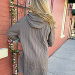 Reversible Hooded Rain Coat In multi blocks/taupe at ooh la la! in Grapevine TX 76051
