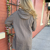 Reversible Hooded Rain Coat In multi blocks/taupe at ooh la la! in Grapevine TX 76051