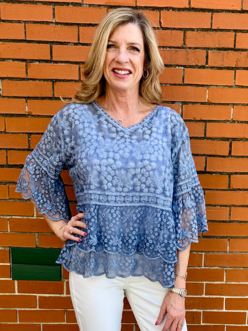 Blue Lace blouse, cotton boho top, bell sleeve shirt, floral embroidery top, scalloped hem blouse, feminine V-neck top, tiered lace top, bohemian fashion, white lace blouse, black vintage style top. at ooh la la! in Grapevine TX 76051