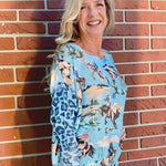 Giddy Up! Western Cowboys and Leopard Batwing Sweater in blue at ooh la la! in Grapevine TX 76051