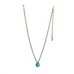 Electric Blue TOVA Milli Necklace, Swarovski crystal jewelry, gold plated teardrop necklace, electric blue pendant, pink crystal necklace, luxury statement jewelry, designer brass necklace, vibrant crystal pendant. at ooh la la! in Grapevine TX 76051