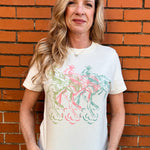 Western crop top, cowboy graphic tee, pastel western shirt, mid-length crop tee, southern fashion, rodeo outfit, vintage cowboy shirt, coastal cowgirl aesthetic. at ooh la la! in Grapevine TX 76051