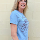 Yeehaw crop tee, western graphic top, mid-length crop shirt, pink rope graphic, southern chic apparel, cowgirl style, soft graphic tee, women's western fashion.
at ooh la la! in Grapevine TX 76051