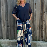 Made in Italy Satin Horse Print Pants in navy at ooh la la! in Grapevine TX 76051