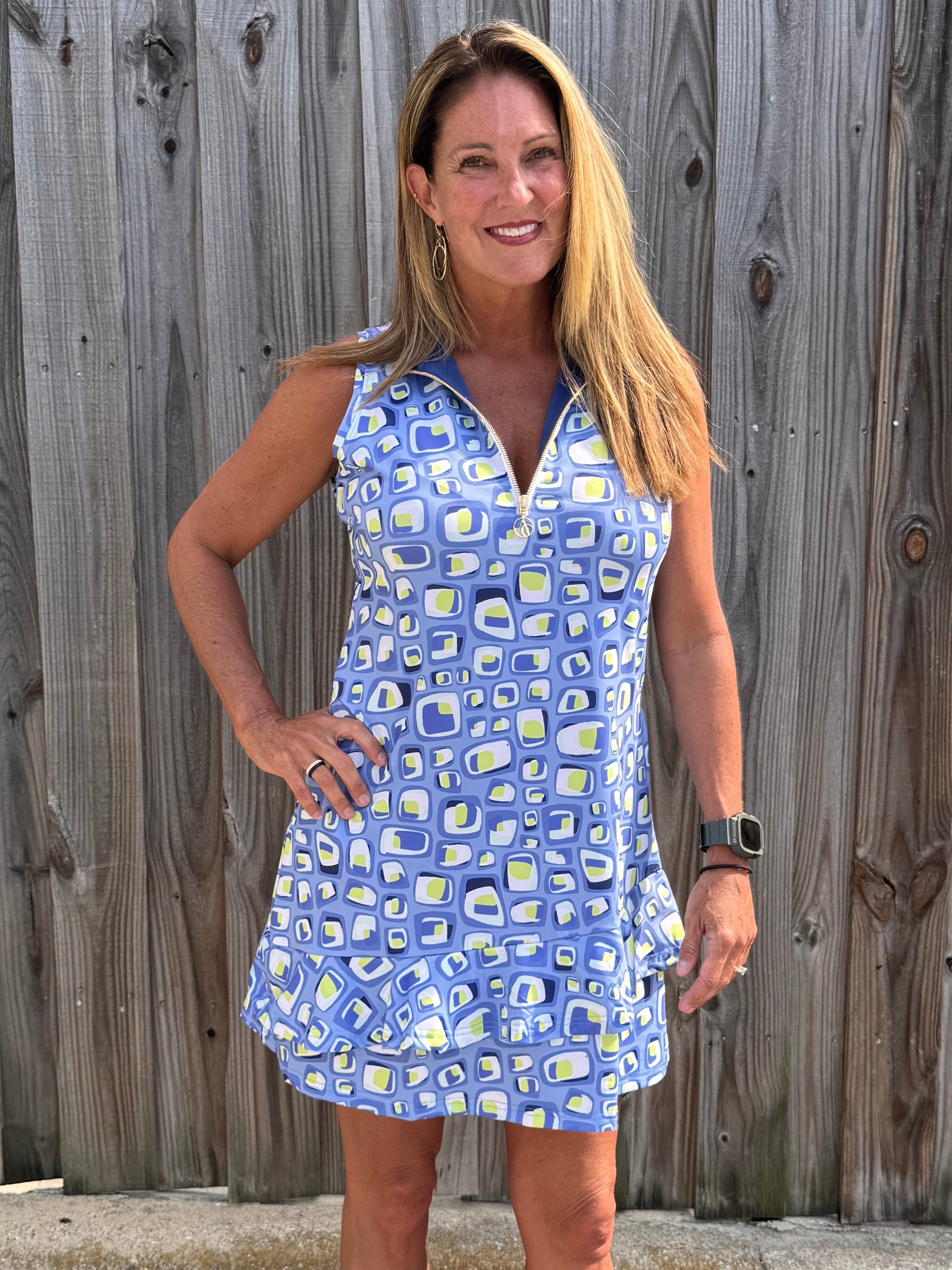 Ana Clare, Women's sport dress, golf dress with pockets, tennis dress ruffle hem, SPF 50 athletic wear, performance golf apparel, UV protective dress, ladies athleisure dress. at ooh la la! in Grapevine TX 76051