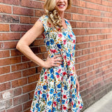 Dress Addict Jade dress, organic cotton floral dress, daisy print scoop neck, bias cut cotton dress, crinkle cotton summer dress, sustainable floral fashion, tiered skirt knee length dress at ooh la la! in Grapevine TX 76051