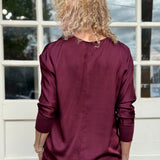 Satin Long Sleeve V-Neck Blouse In wine at ooh la la! In Grapevine TX 76051
