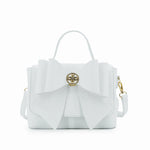 Vegan leather crossbody in white, bow satchel bag, designer vegan handbags, women's spring purses, bow front handbag, gold hardware crossbody, eco-friendly satchel, Zoey bag.
ooh la la! in Grapevine TX 76051