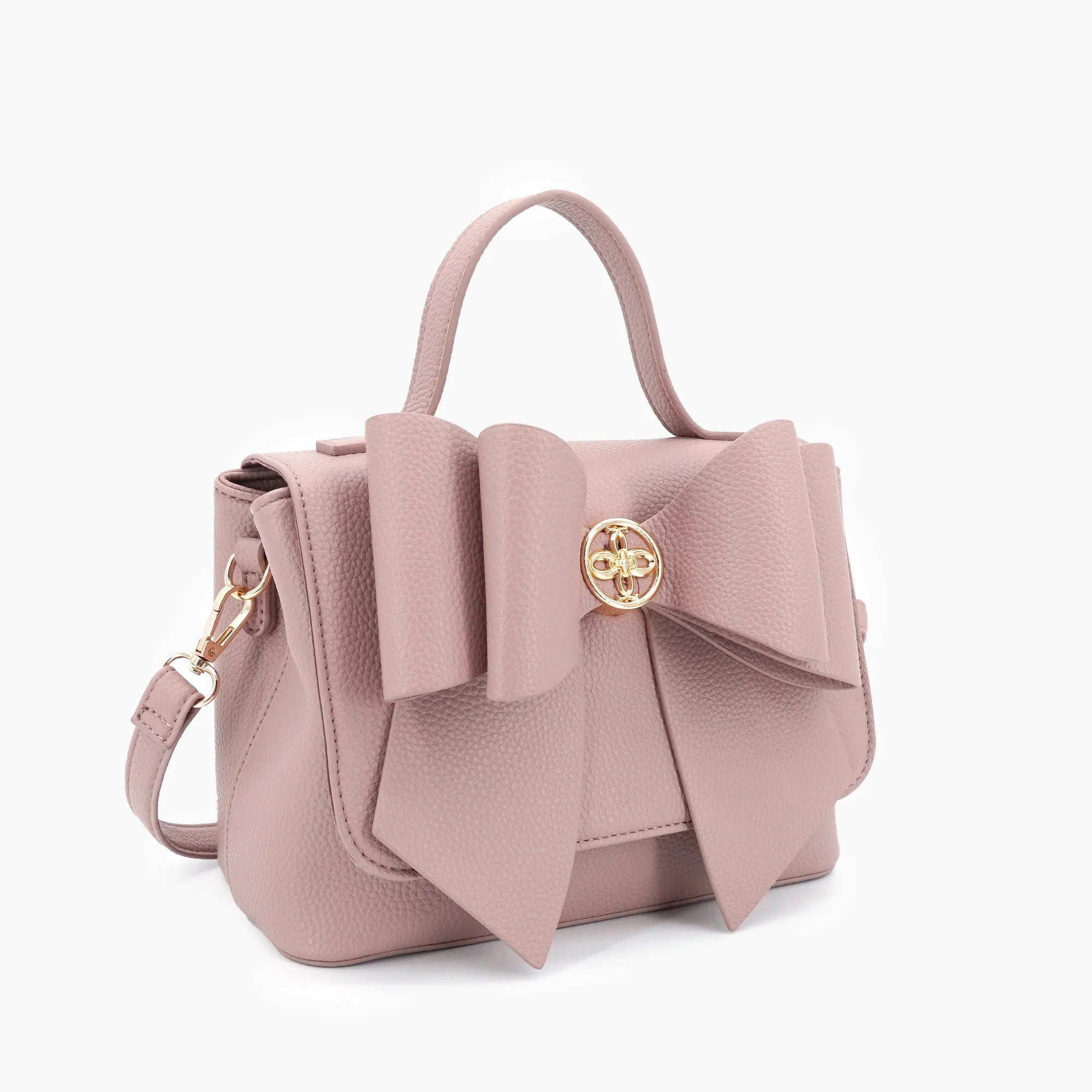 Vegan leather crossbody in blush, bow satchel bag, designer vegan handbags, women's spring purses, bow front handbag, gold hardware crossbody, eco-friendly satchel, Zoey bag.
ooh la la! in Grapevine TX 76051